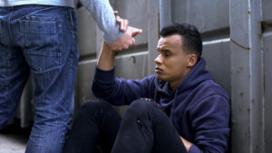 /wp-content/uploads/2024/04/bigstock-Man-Passing-By-Offering-Helpi-349827865-scaled-1-1920x1080.jpg